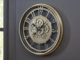 Fine Furniture & Decor - Ashley Furniture - Gilover Wall Decor - Wall Clock / Champagne Finish - A8010386