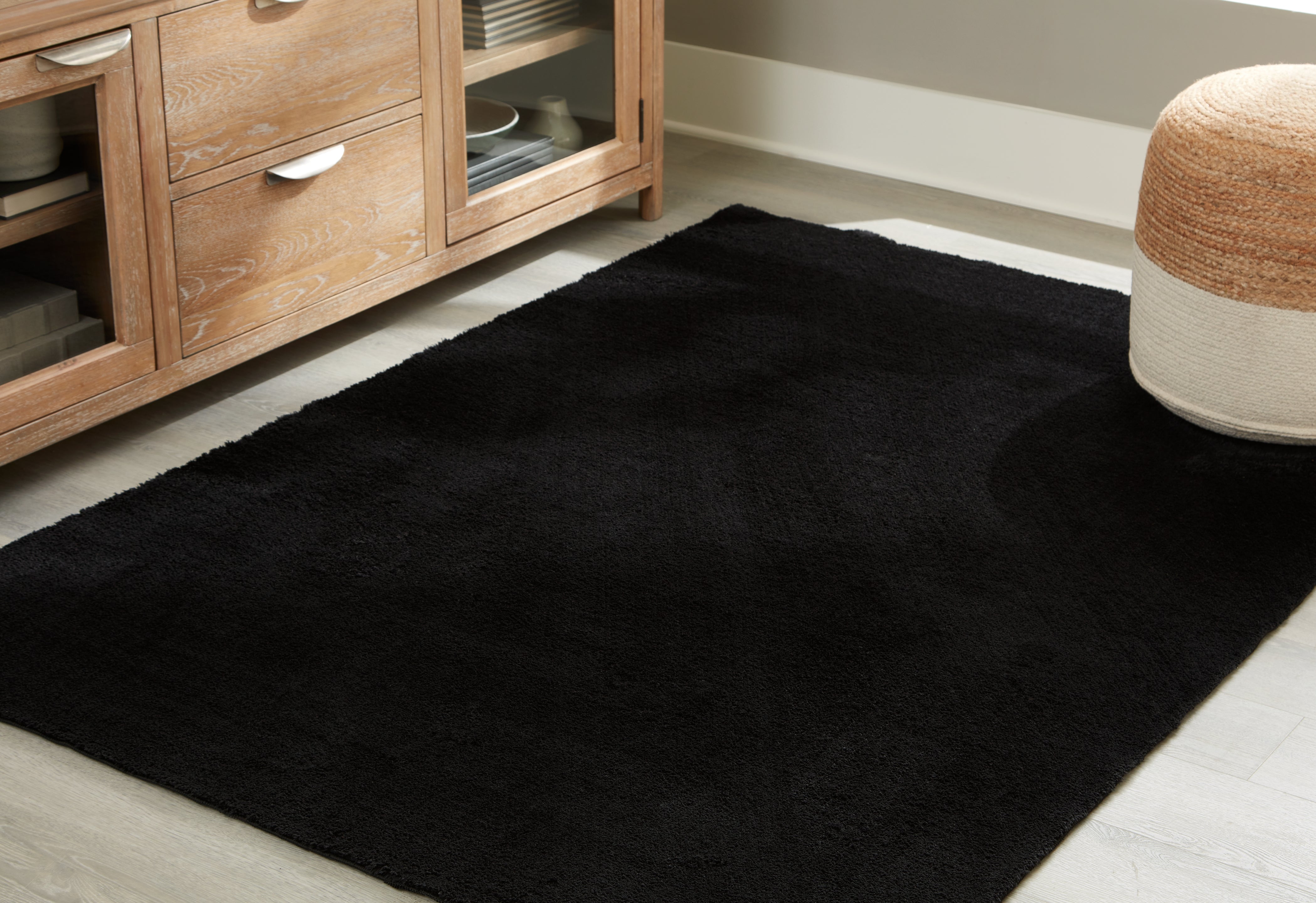 Fine Furniture & Decor - Ashley Furniture - Anaben Rug - 5' x 7' Washable Rug / Black - R406312