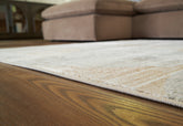 Fine Furniture & Decor - Ashley Furniture - Truward Rug - 8' x 10' Rug / Linen/Gray/Caramel - R406471