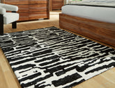Fine Furniture & Decor - Ashley Furniture - Bramshaw Rug - 10' x 14' Rug / Black/Ivory - R406760