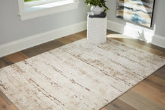 Fine Furniture & Decor - Ashley Furniture - Kasney Rug - 5' x 7' Rug / Cream/Brown - R406852