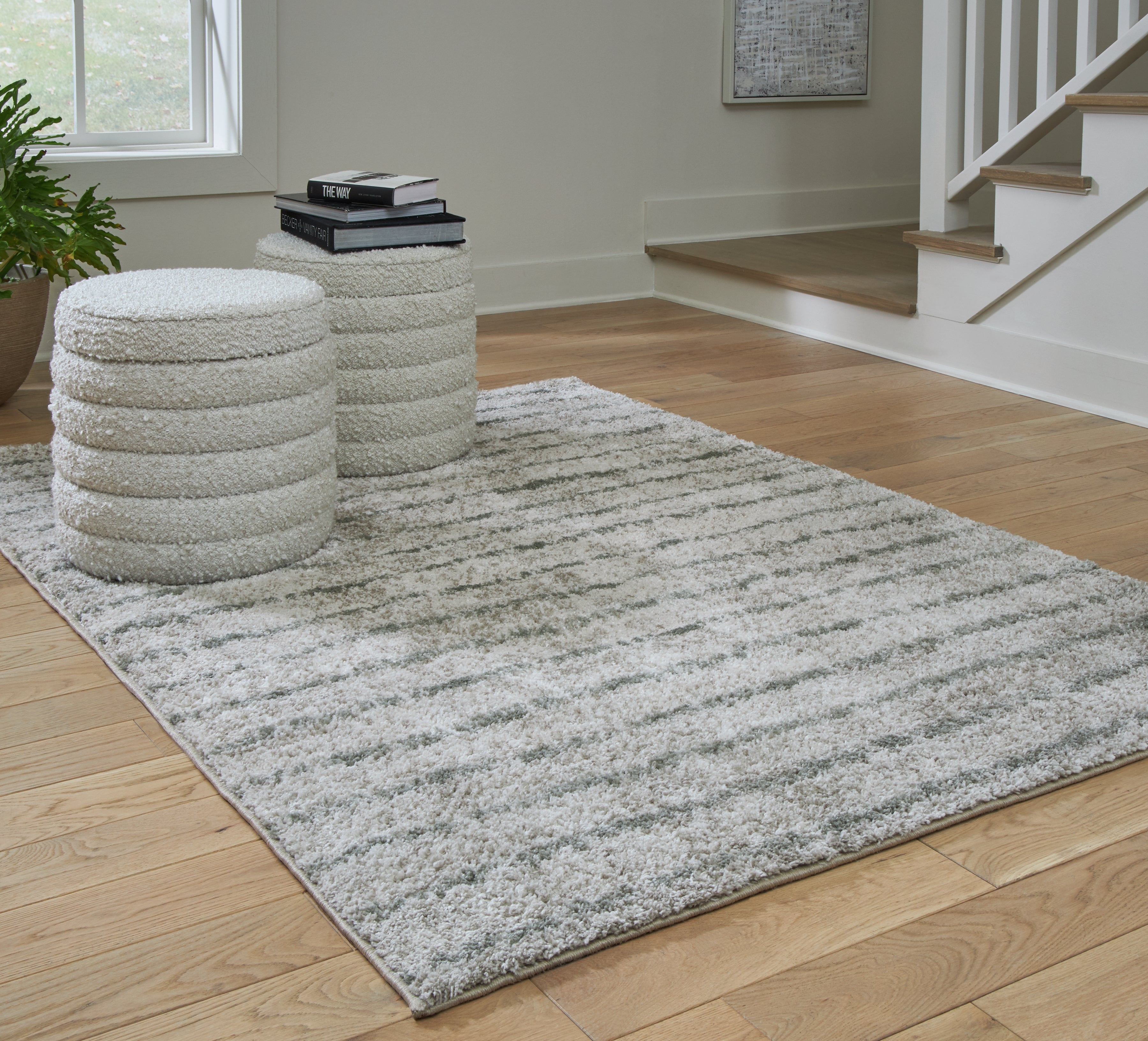 Fine Furniture & Decor - Ashley Furniture - Laddway Rug - 5' x 7' Rug / Cream/Green - R406882