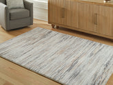 Fine Furniture & Decor - Ashley Furniture - Nace Rug - 7'6" x 9'6" Area Rug / Gray/Brown/White - R407471