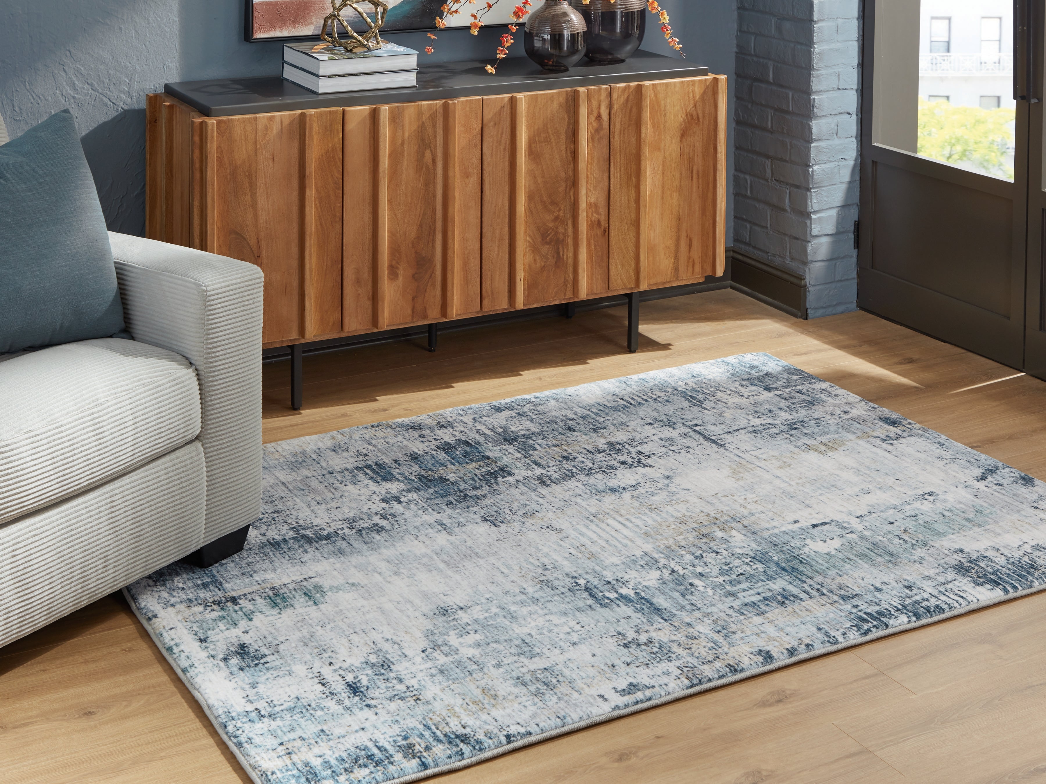 Fine Furniture & Decor - Ashley Furniture - Arlenmont Rug - 5' x 7' Area Rug / Blue/White/Brown - R407482