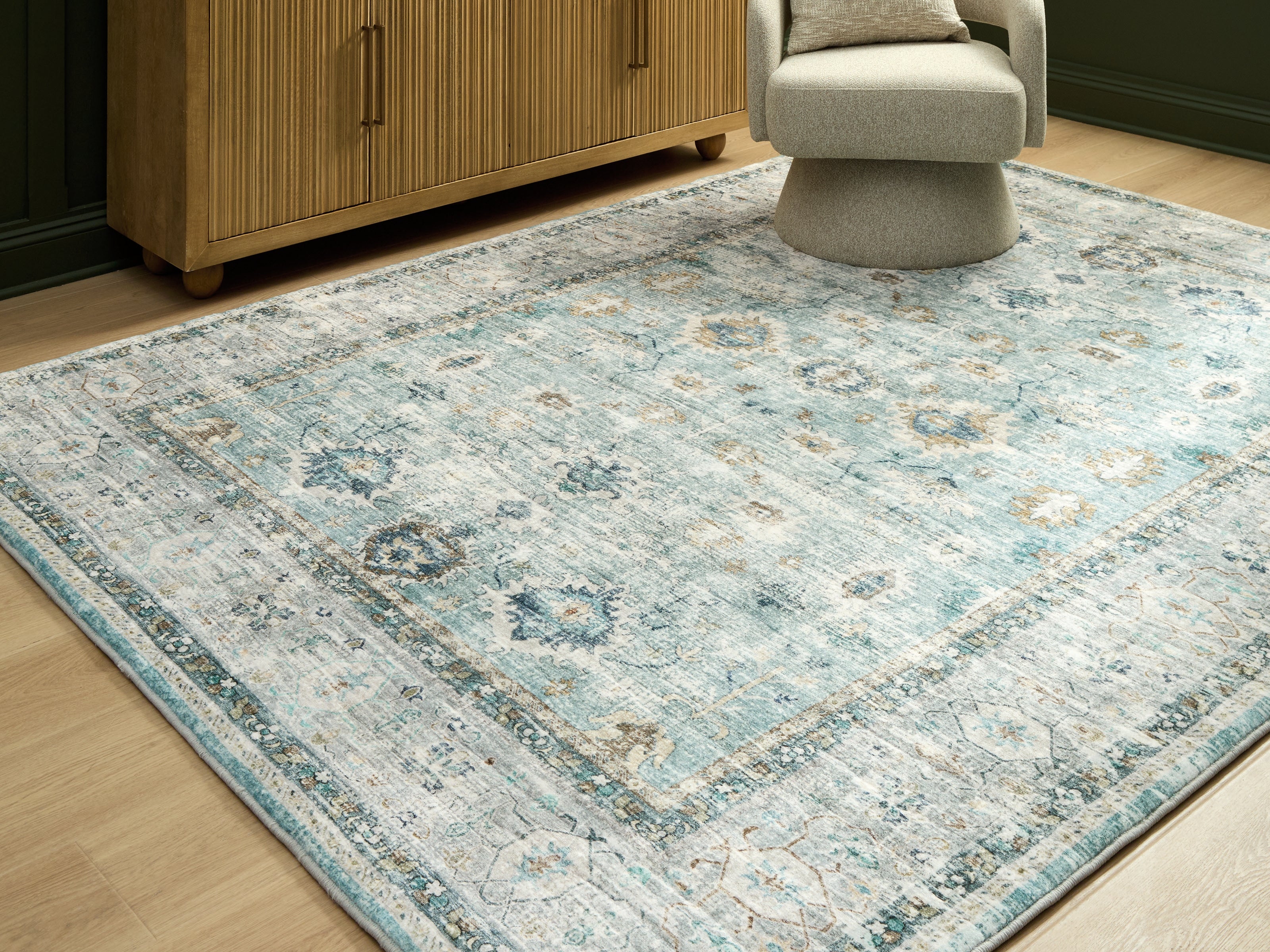Fine Furniture & Decor - Ashley Furniture - Ladstoney Rug - 5' x 7' Area Rug / Teal/Beige/Ochre - R407502