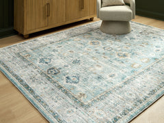 Fine Furniture & Decor - Ashley Furniture - Ladstoney Rug - 5' x 7' Area Rug / Teal/Beige/Ochre - R407502