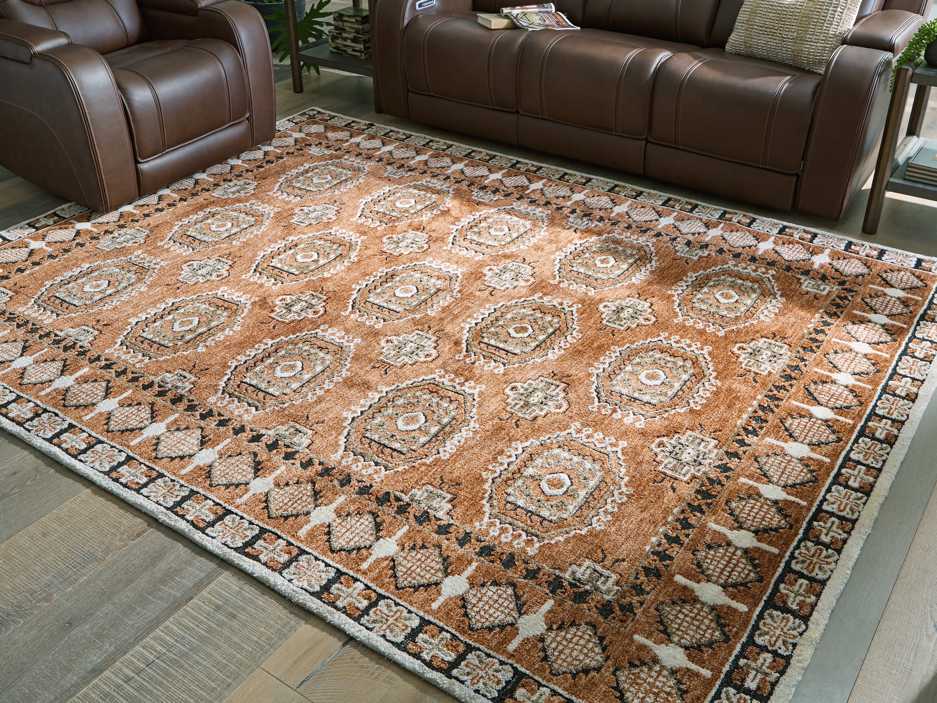 Fine Furniture & Decor - Ashley Furniture - Qaabiz Rug - 7'8" x 10' Area Rug / Sienna/Ivory/Black - R407521