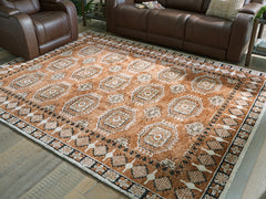 Fine Furniture & Decor - Ashley Furniture - Qaabiz Rug - 7'8" x 10' Area Rug / Sienna/Ivory/Black - R407521