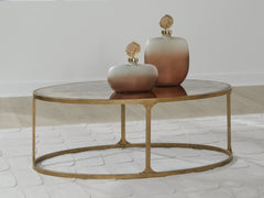 Fine Furniture & Decor - Ashley Furniture - Korajane Coffee Table - Oval Cocktail Table / Antique Gold - T399-0