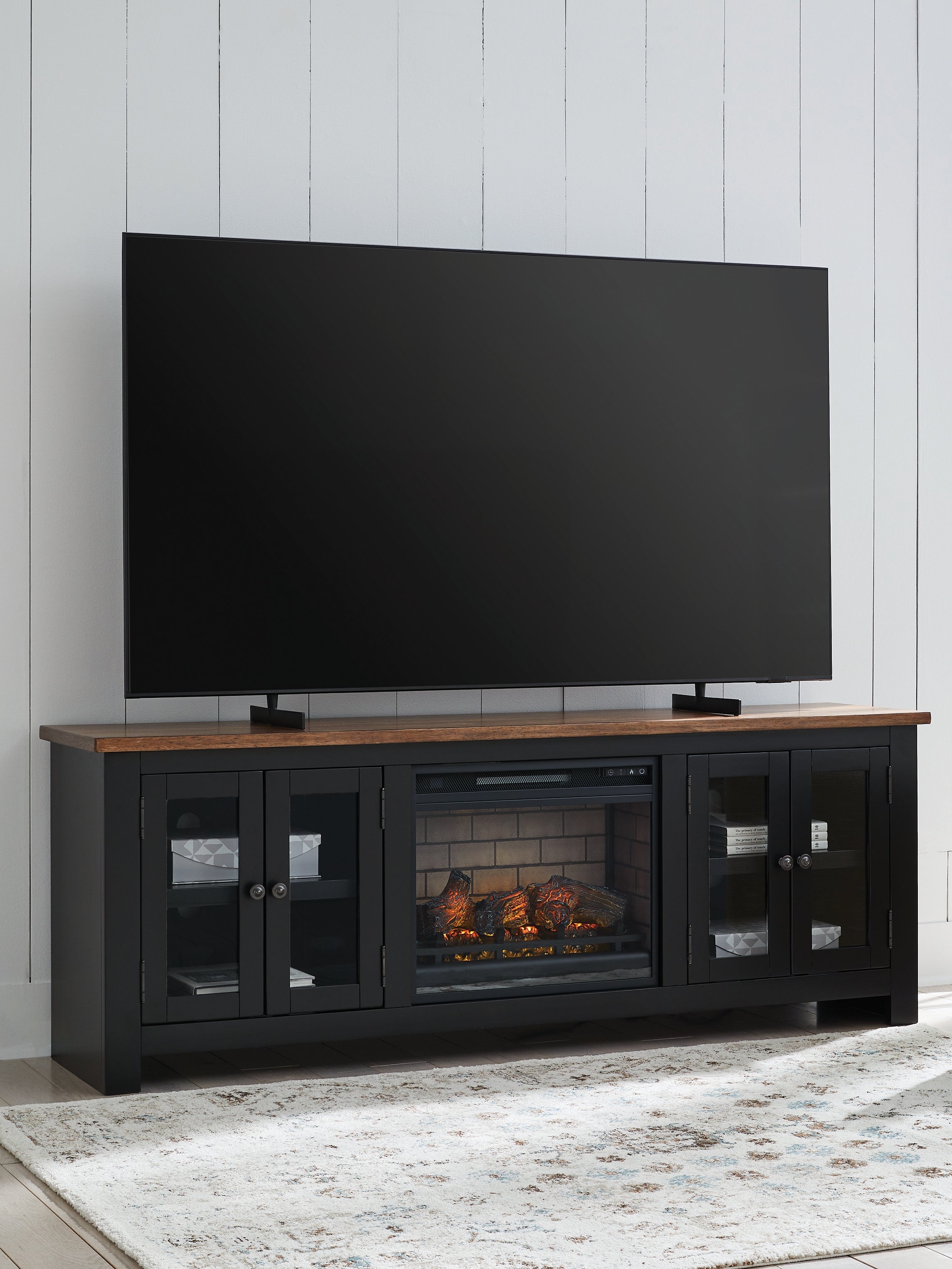 Fine Furniture & Decor - Ashley Furniture - Wildenauer 76" TV Stand with Electric Fireplace - 76" TV Stand with Electric Fireplace / Brown/Black - W664W1