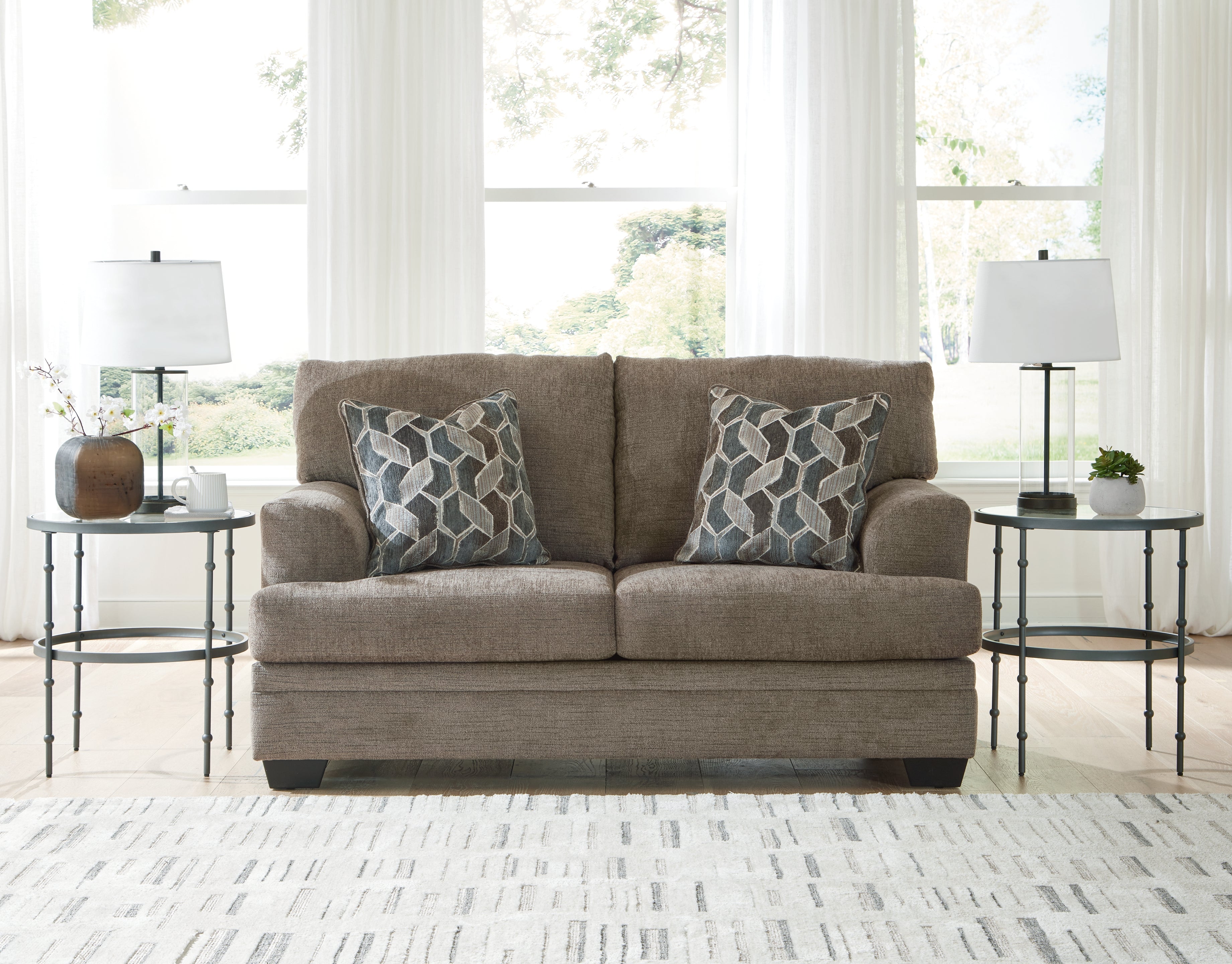 Fine Furniture & Decor - Ashley Furniture - Stonemeade Living Room - Loveseat / Nutmeg - 5950535