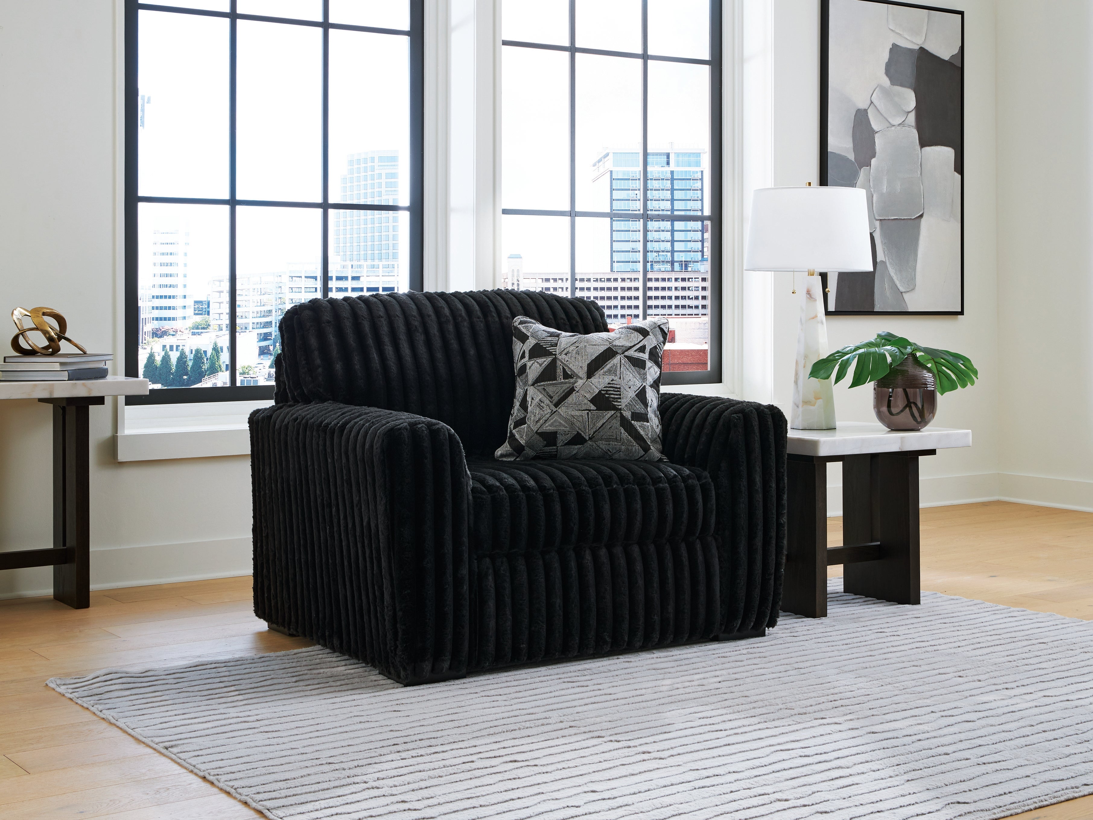 Fine Furniture & Decor - Ashley Furniture - Midnight-Madness Living Room - Chair and a Half / Onyx - 9810323