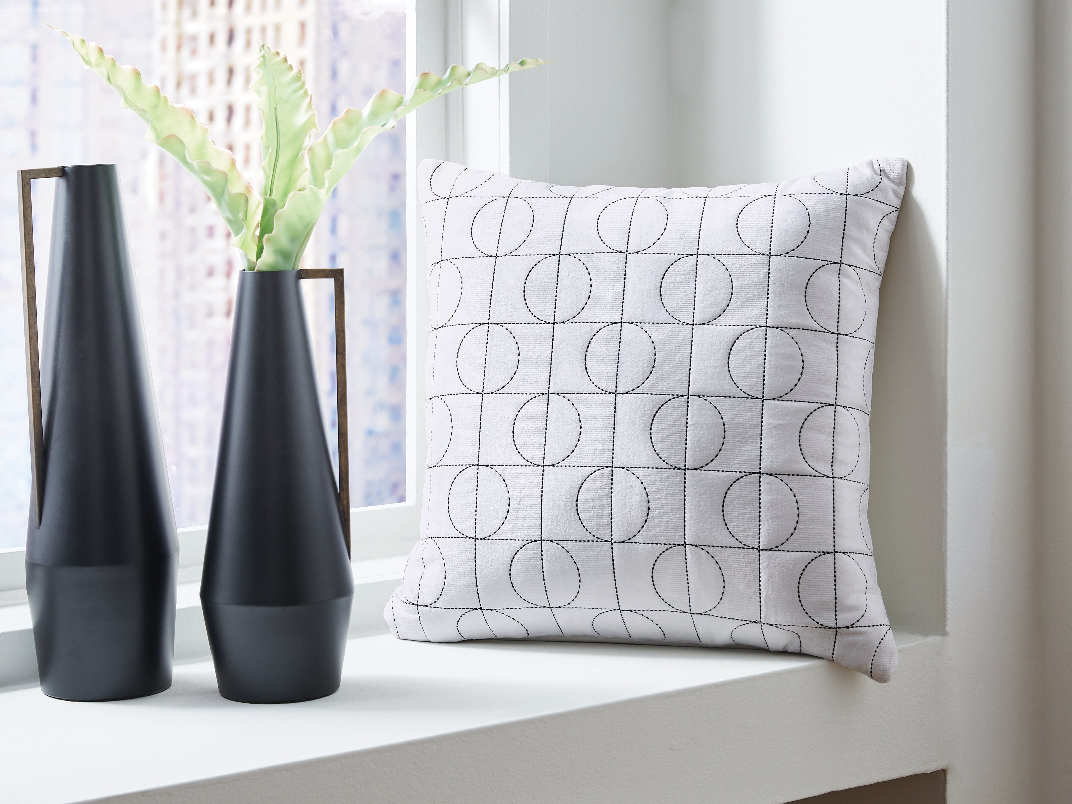 Fine Furniture & Decor - Ashley Furniture - Kydner Pillows - Pillow (4/CS) / White/Black - A1001107