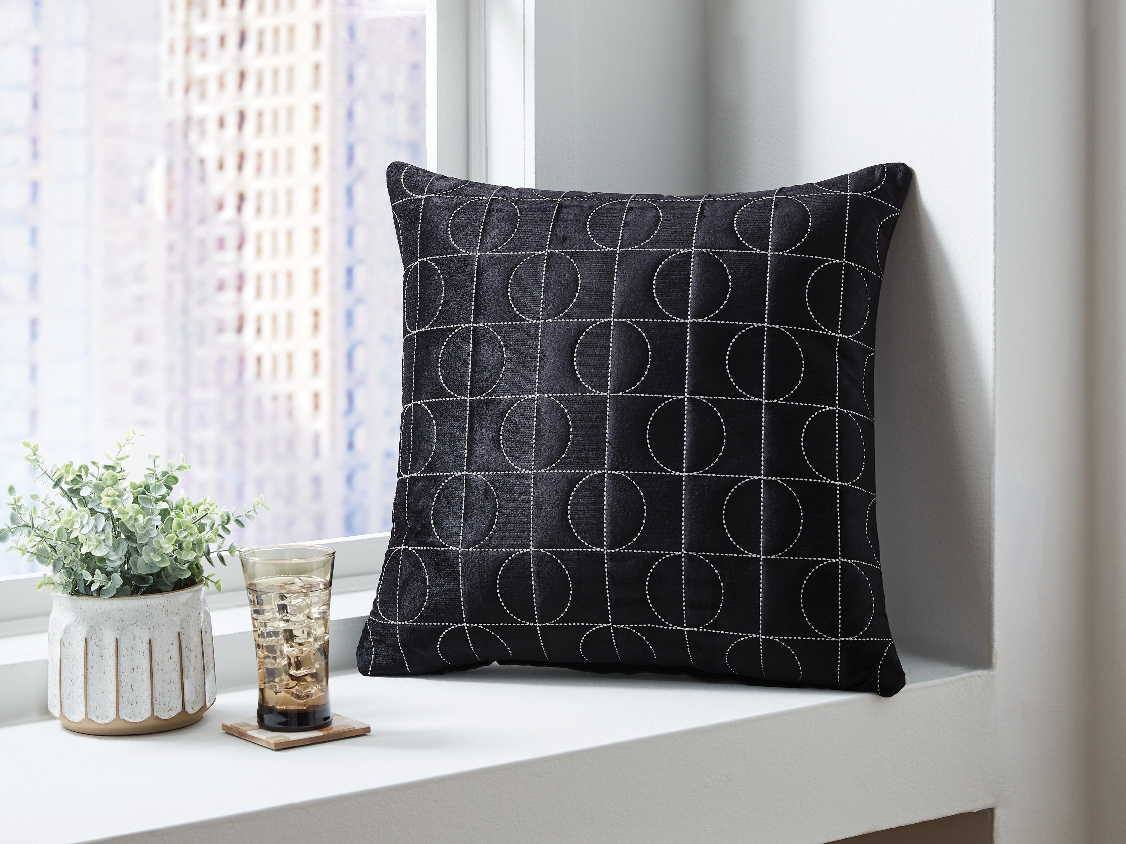 Fine Furniture & Decor - Ashley Furniture - Kydner Pillows - Pillow (4/CS) / Black/Silver - A1001108