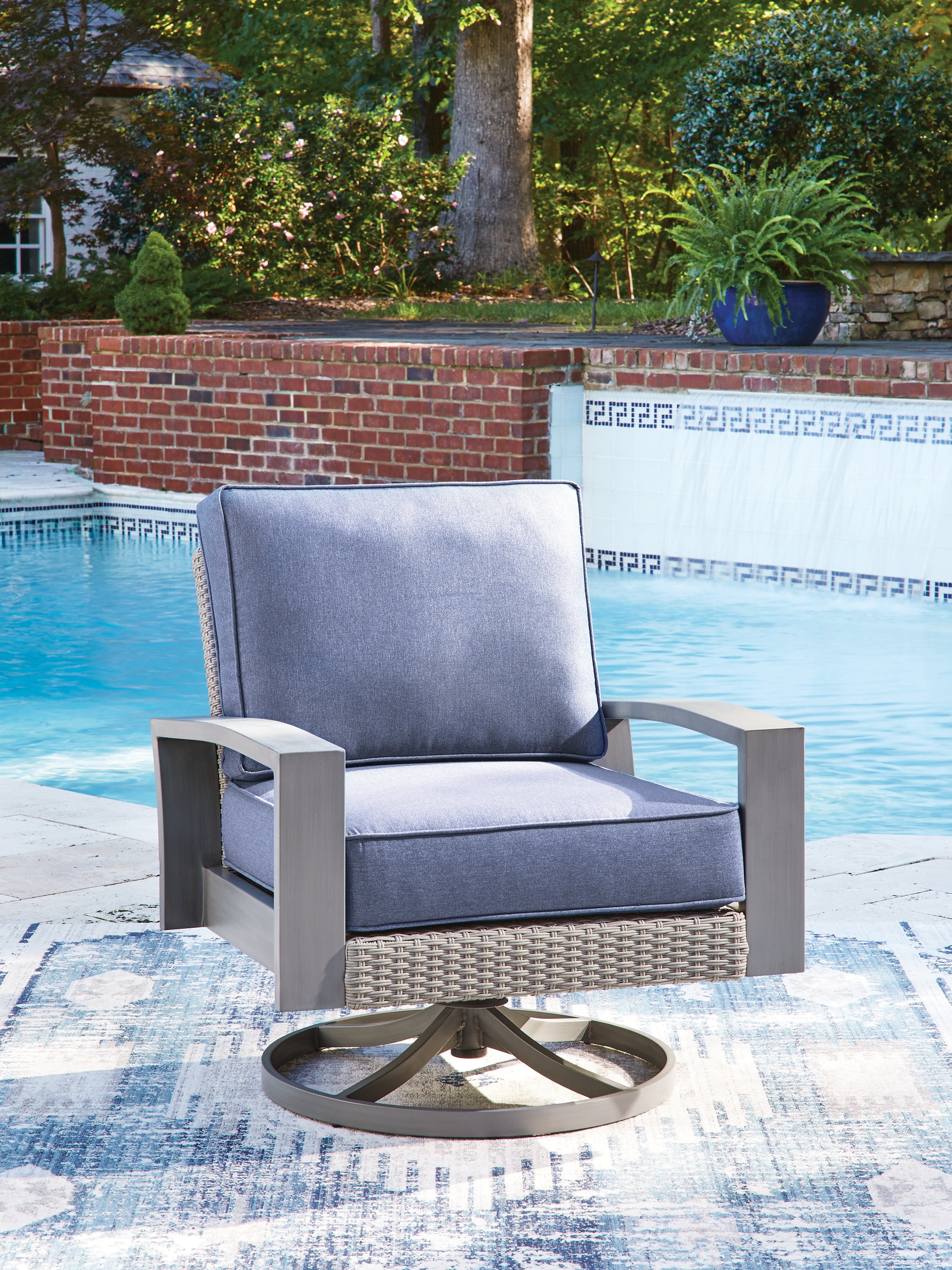 Fine Furniture & Decor - Ashley Furniture - Half Moon Beach Outdoor - Swivel Lounge w/ Cushion / Blue/Gray - PCP418-821