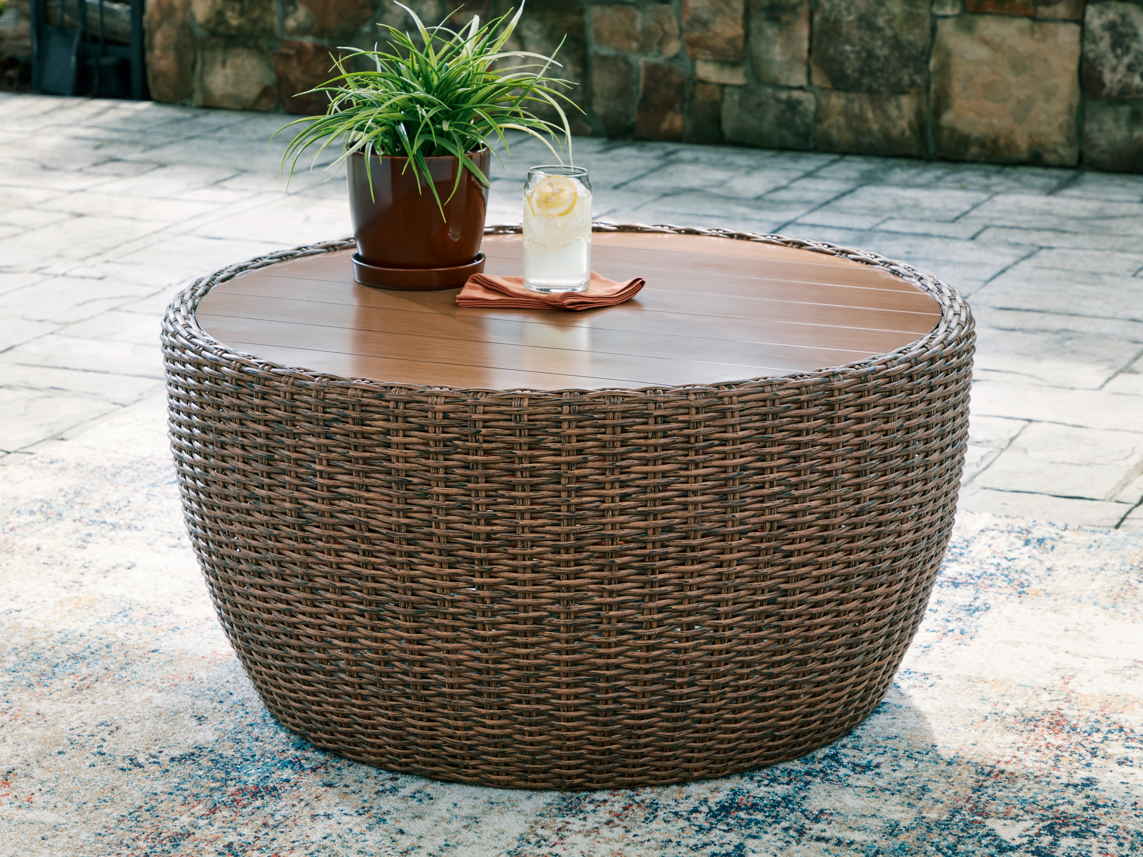 Fine Furniture & Decor - Ashley Furniture - Double Point Outdoor - Round Cocktail Table / Beige - PCP503-708