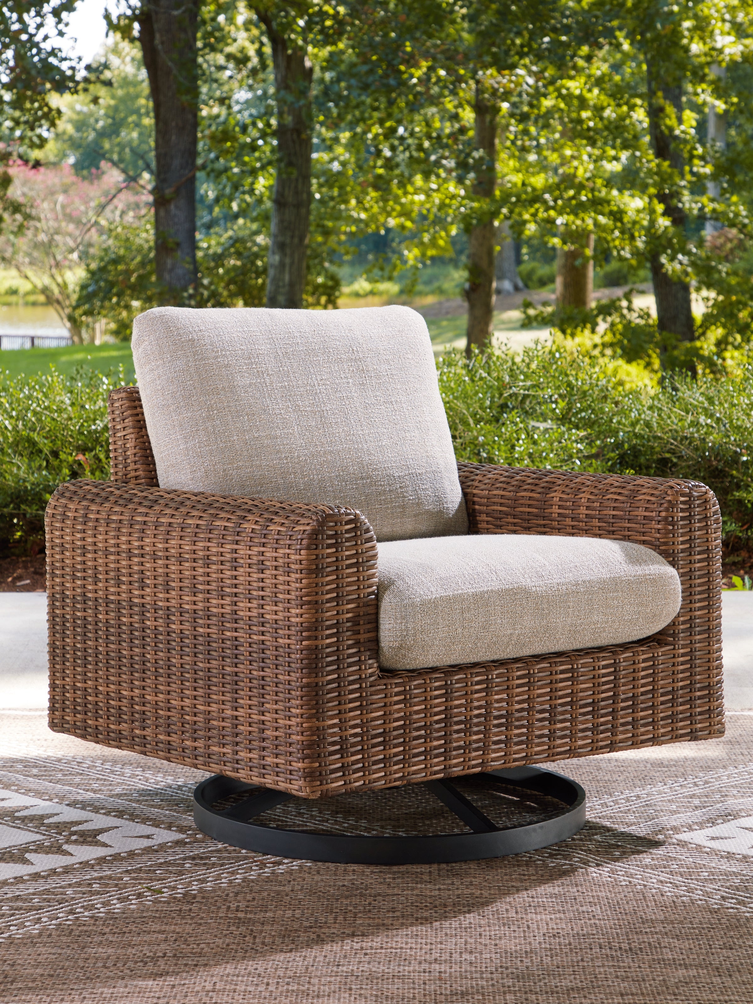 Fine Furniture & Decor - Ashley Furniture - Dolan Creek Outdoor - Swivel Lounge w/ Cushion / Gray/Brown - PCP610-821