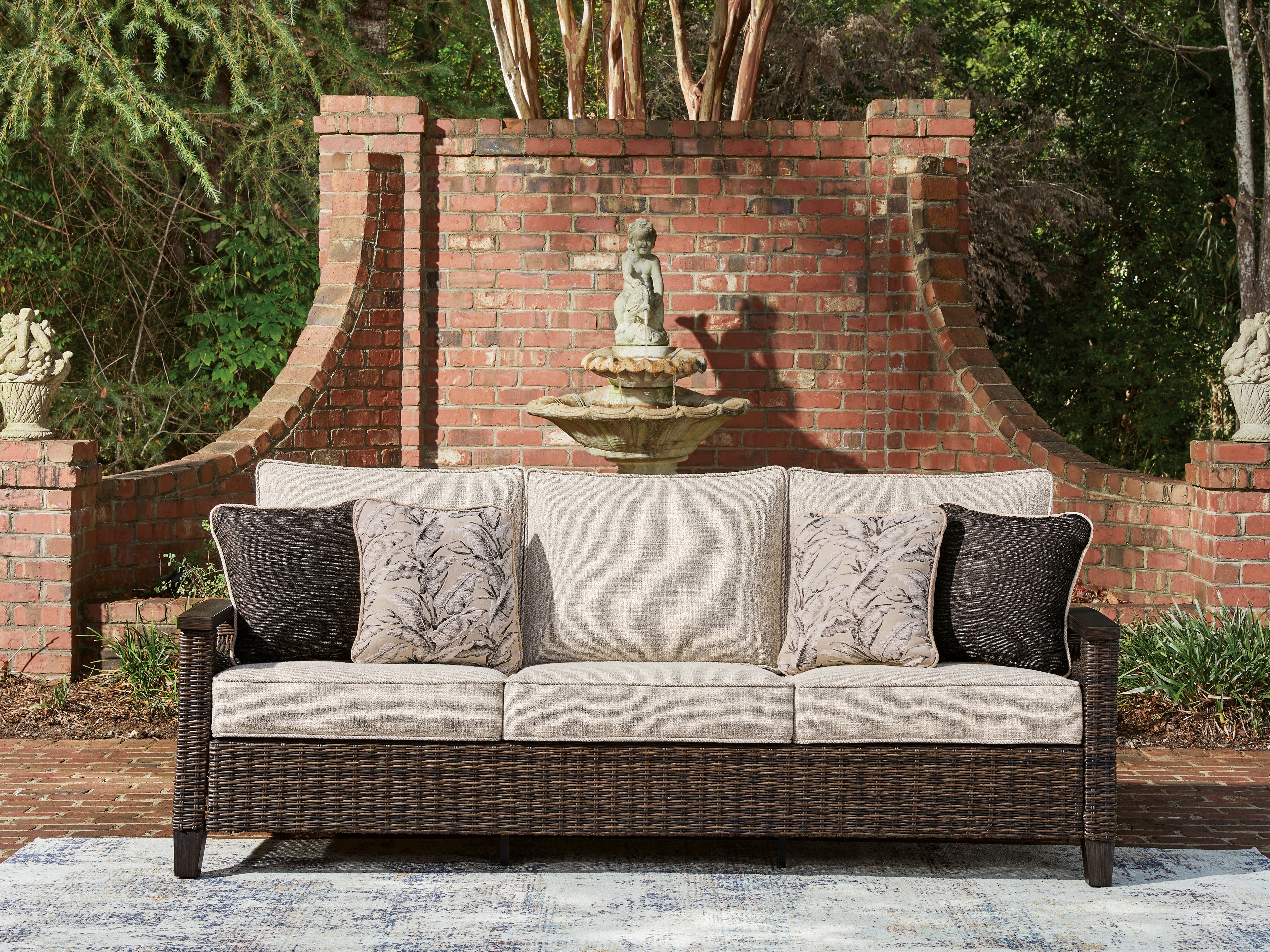 Fine Furniture & Decor - Ashley Furniture - Monterey Point Outdoor - Sofa with Cushion / Dark Brown - PCP760-838