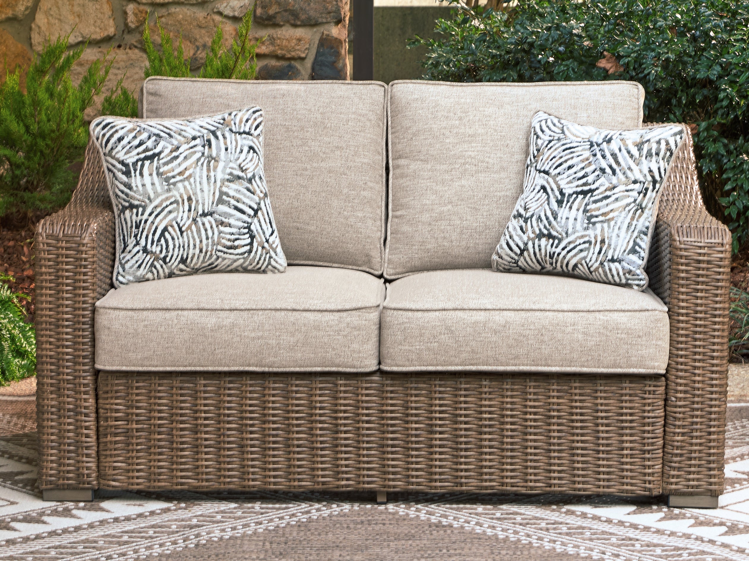 Fine Furniture & Decor - Ashley Furniture - Laguna Heights Outdoor - Loveseat w/Cushion / Beige - PCP790-835