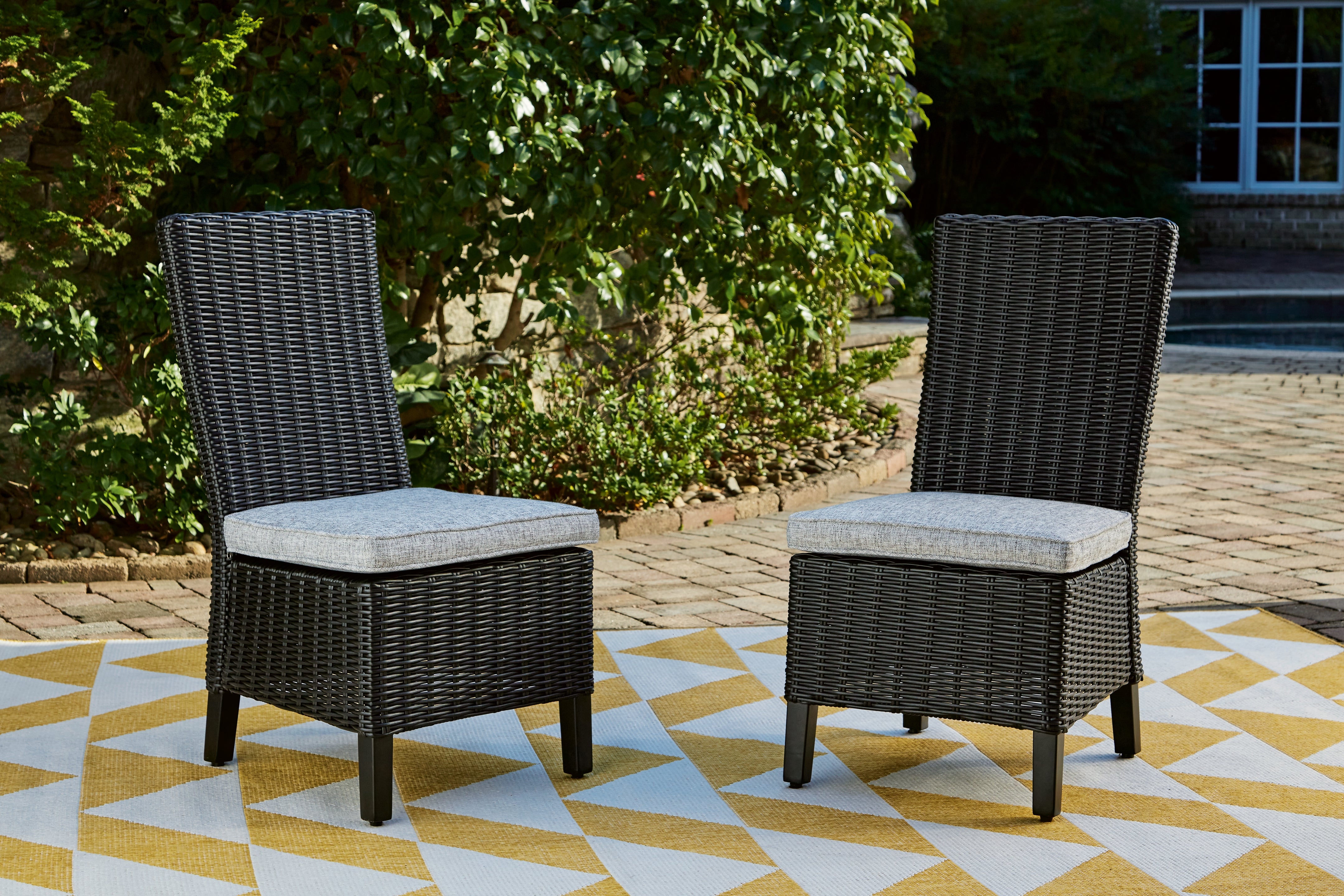 Fine Furniture & Decor - Ashley Furniture - Beachcroft Outdoor - Side Chair with Cushion (Set of 2) / Black/Light Gray - P792-601