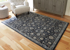 Fine Furniture & Decor - Ashley Furniture - Hilcott Rug - 5'3" x 7'3" Rug / Blue/Cream/Brown - R406112