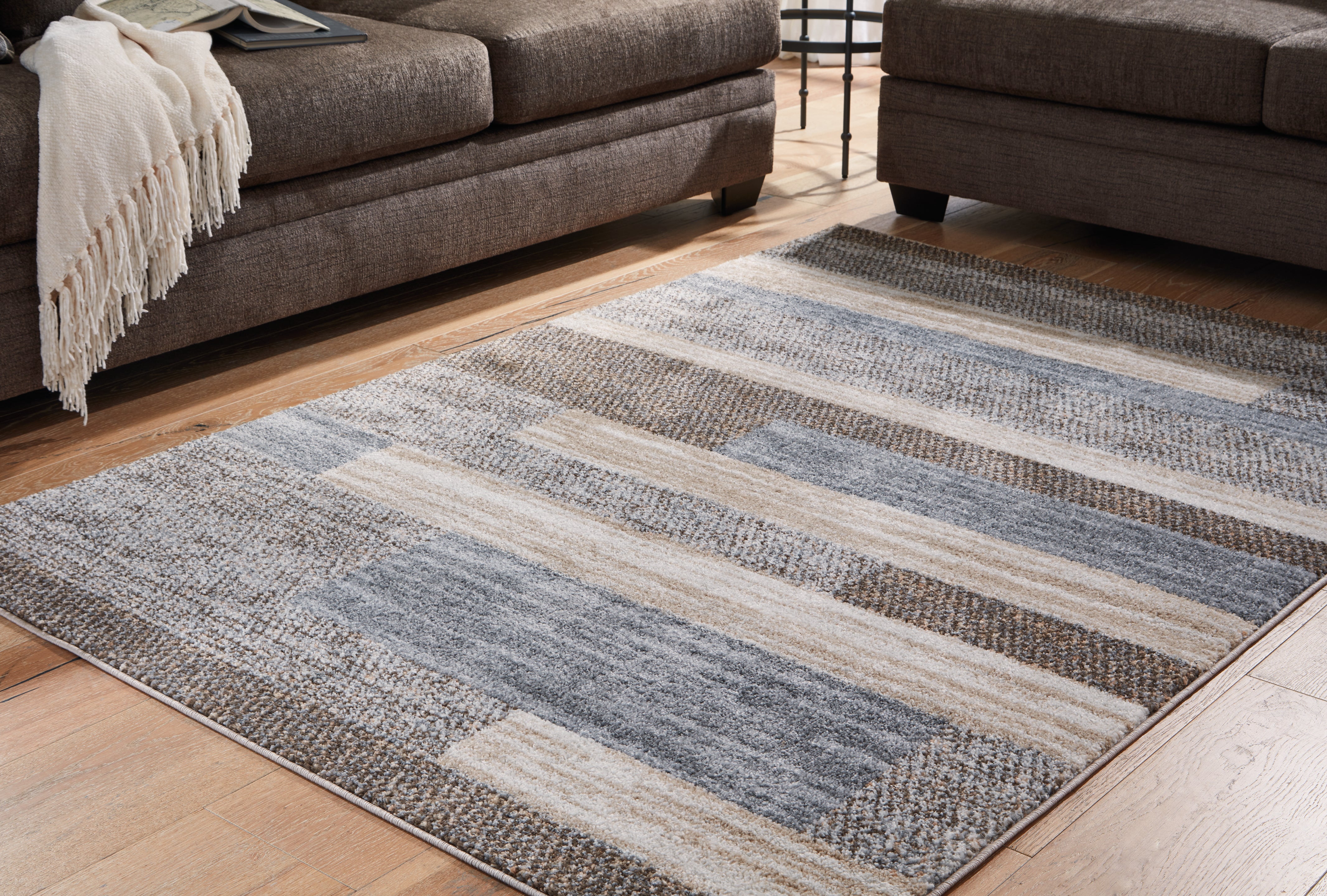 Fine Furniture & Decor - Ashley Furniture - Sethburn Rug - 8' x 10' Rug / Cream/Brown/Gray - R406591