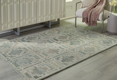 Fine Furniture & Decor - Ashley Furniture - Jossland Rug - 8' x 10' Rug / Green/Ivory - R406911