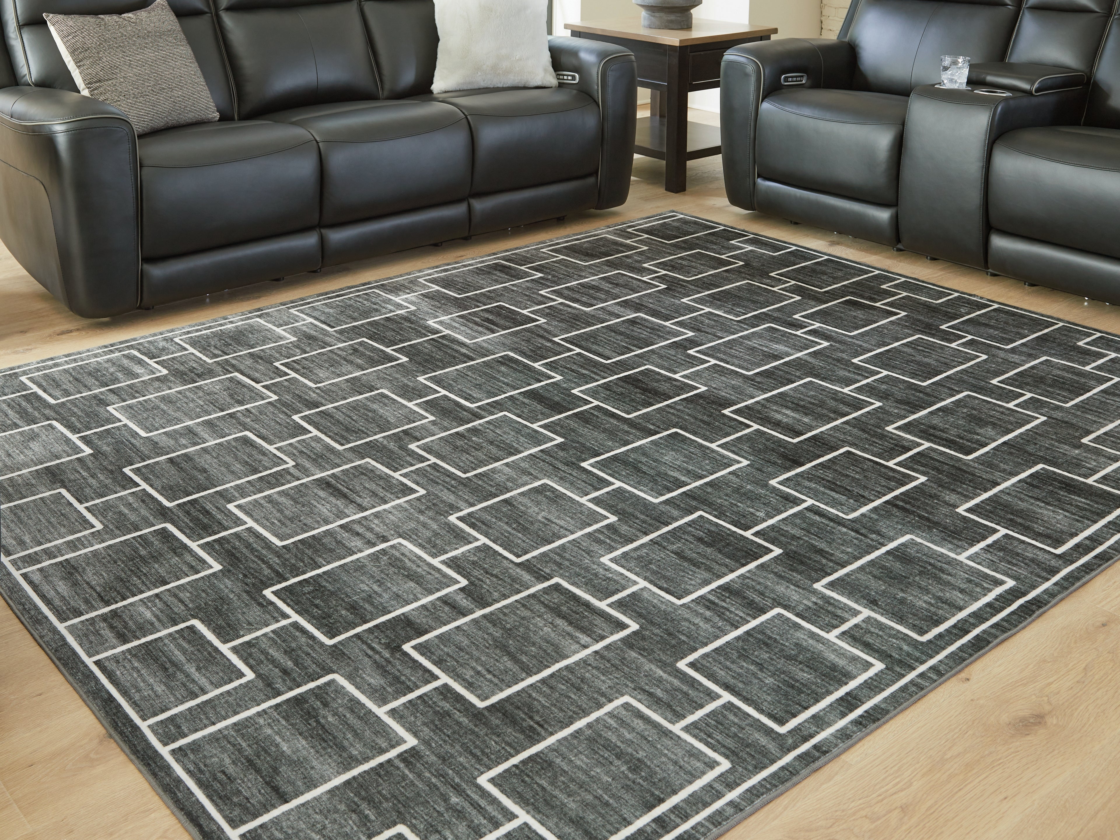 Fine Furniture & Decor - Ashley Furniture - Elderland Rug - Washable 7'6" x 9'6" Area Rug / Black/Gray - R407401