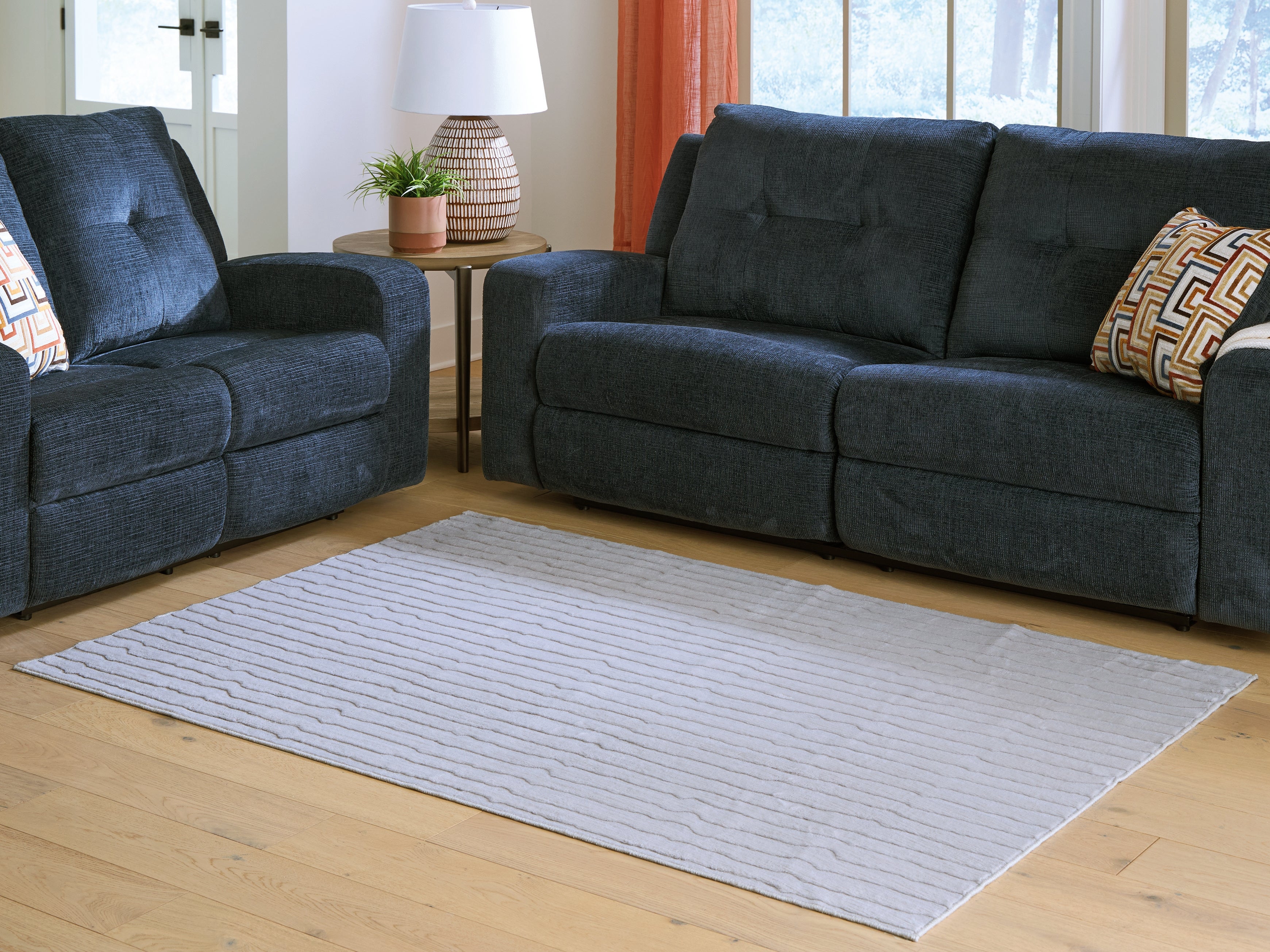 Fine Furniture & Decor - Ashley Furniture - Worthley Rug - Washable 5' x 7' Area Rug / Gray - R407452