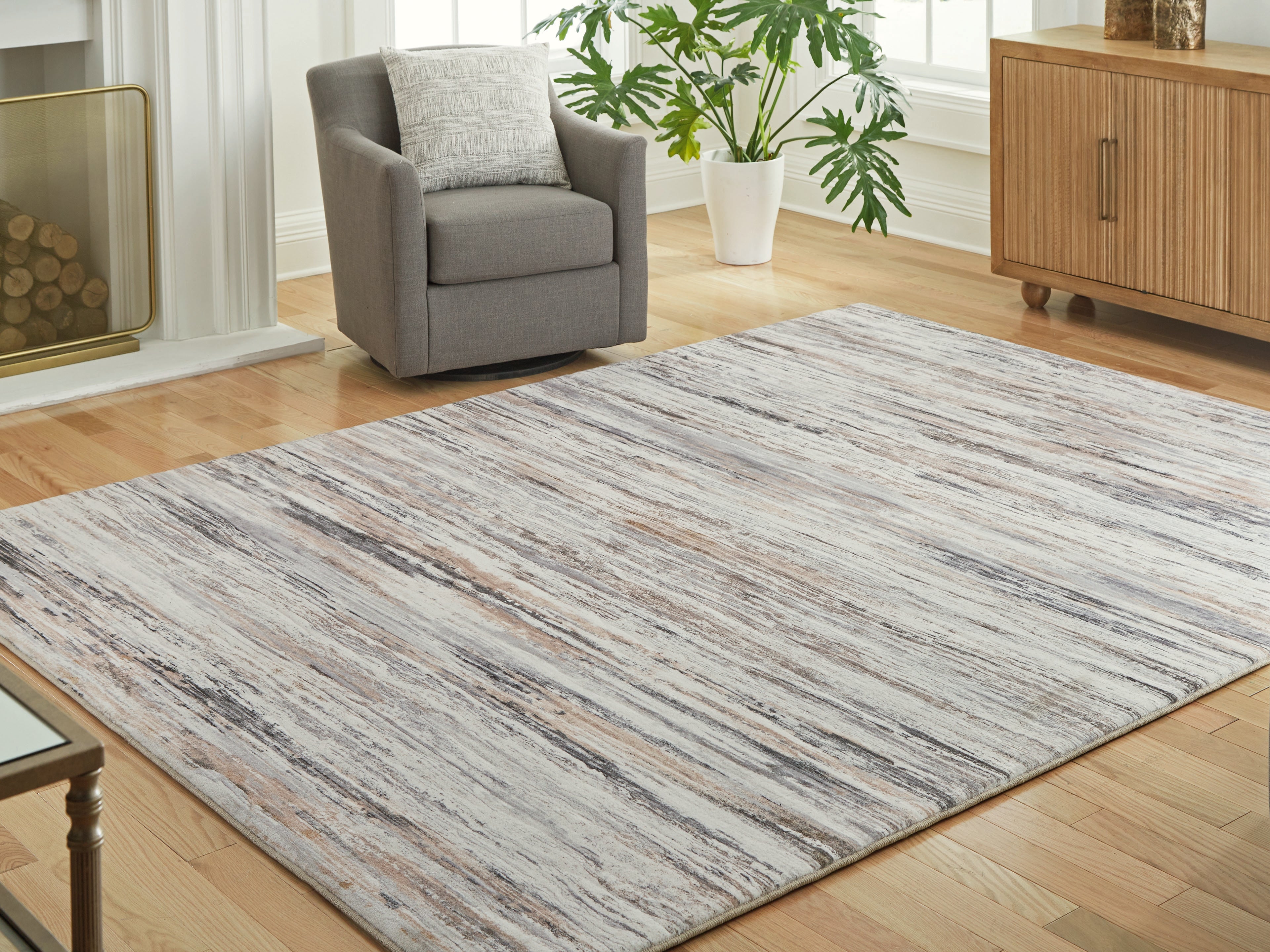 Fine Furniture & Decor - Ashley Furniture - Nace Rug - 7'6" x 9'6" Area Rug / Gray/Brown/White - R407471