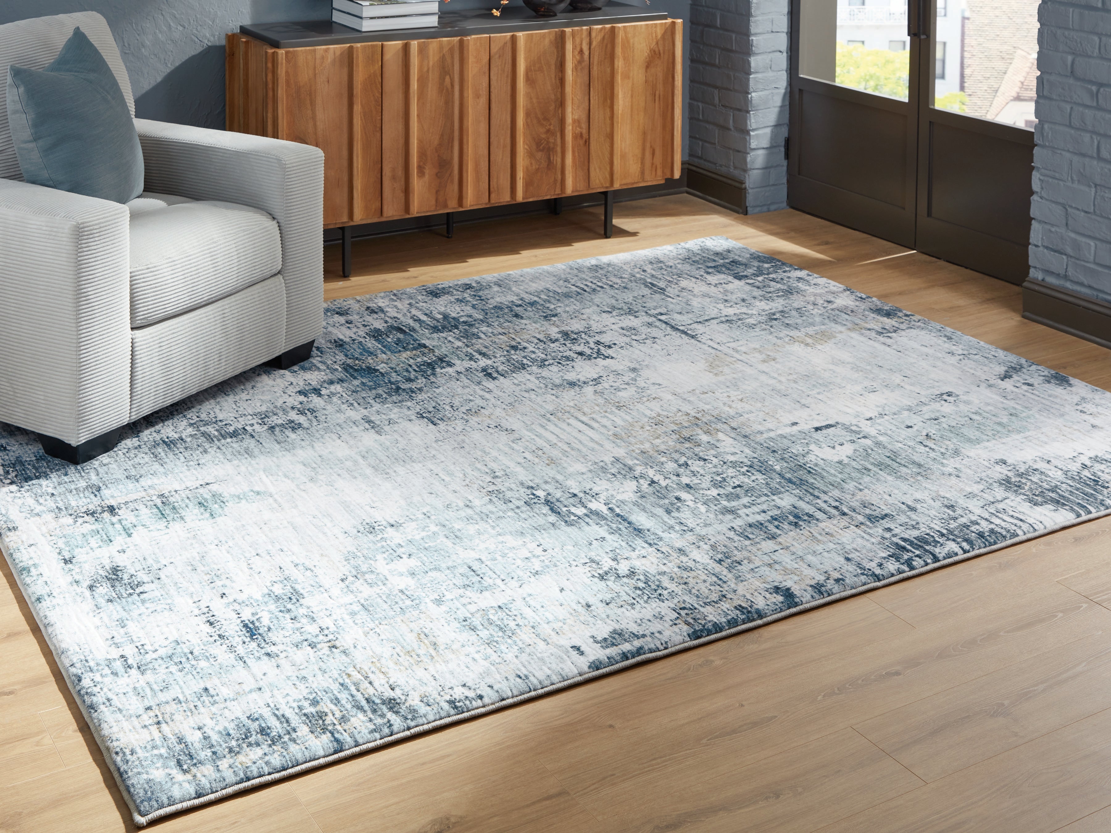 Fine Furniture & Decor - Ashley Furniture - Arlenmont Rug - 7'6" x 9'6" Area Rug / Blue/White/Brown - R407481