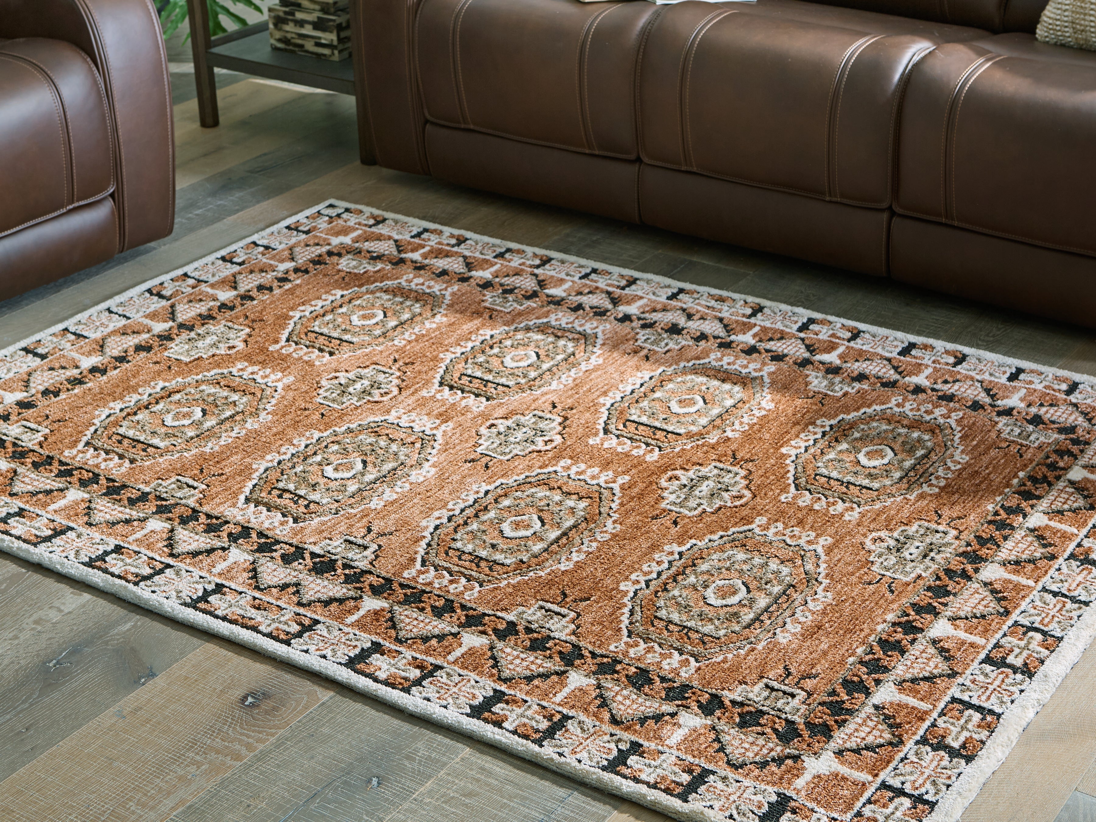 Fine Furniture & Decor - Ashley Furniture - Qaabiz Rug - 5' x 7' Area Rug / Sienna/Ivory/Black - R407522