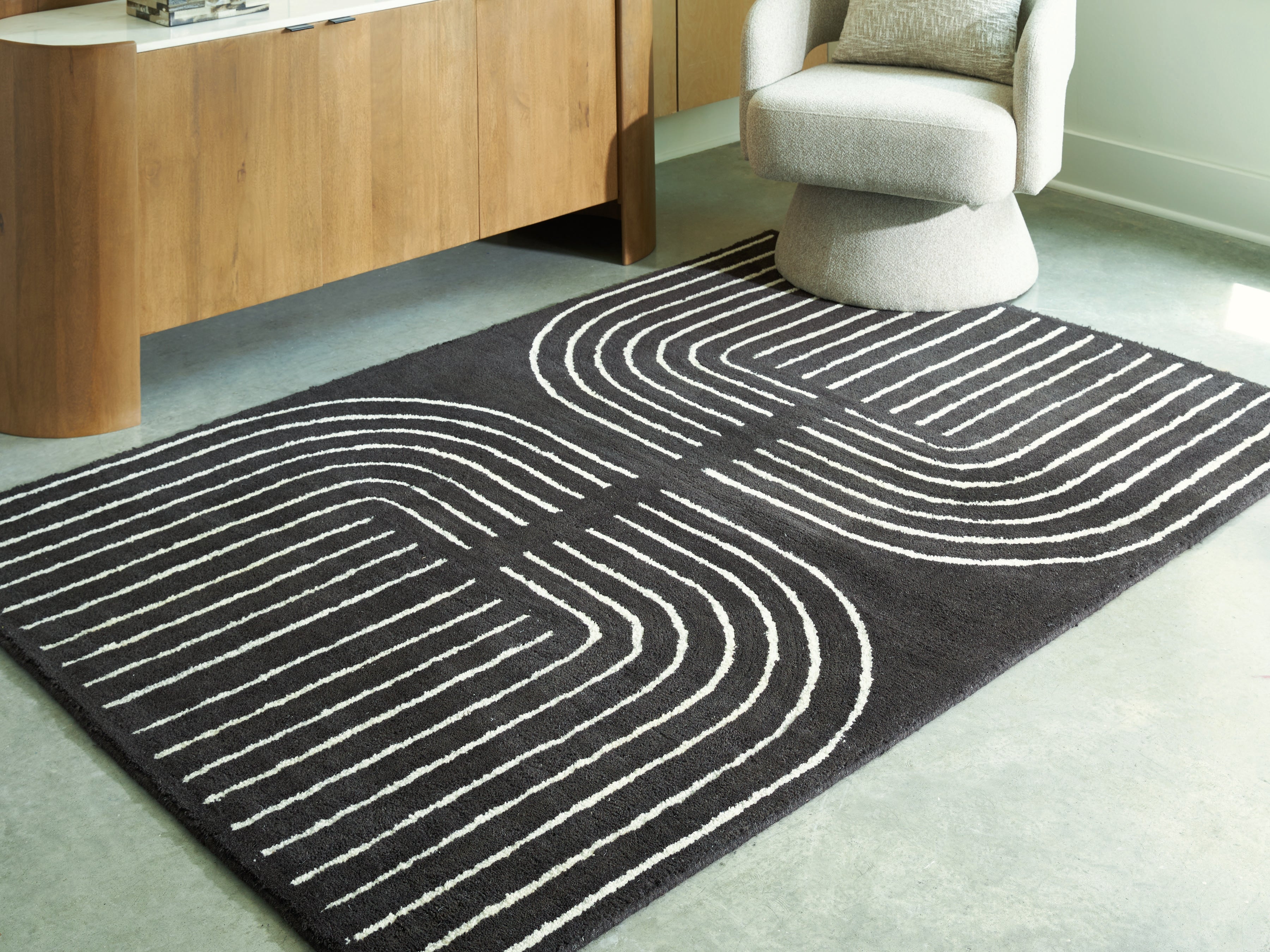 Fine Furniture & Decor - Ashley Furniture - Eldonmore Rug - 5' x 7' Area Rug / Black/Ivory - R407572