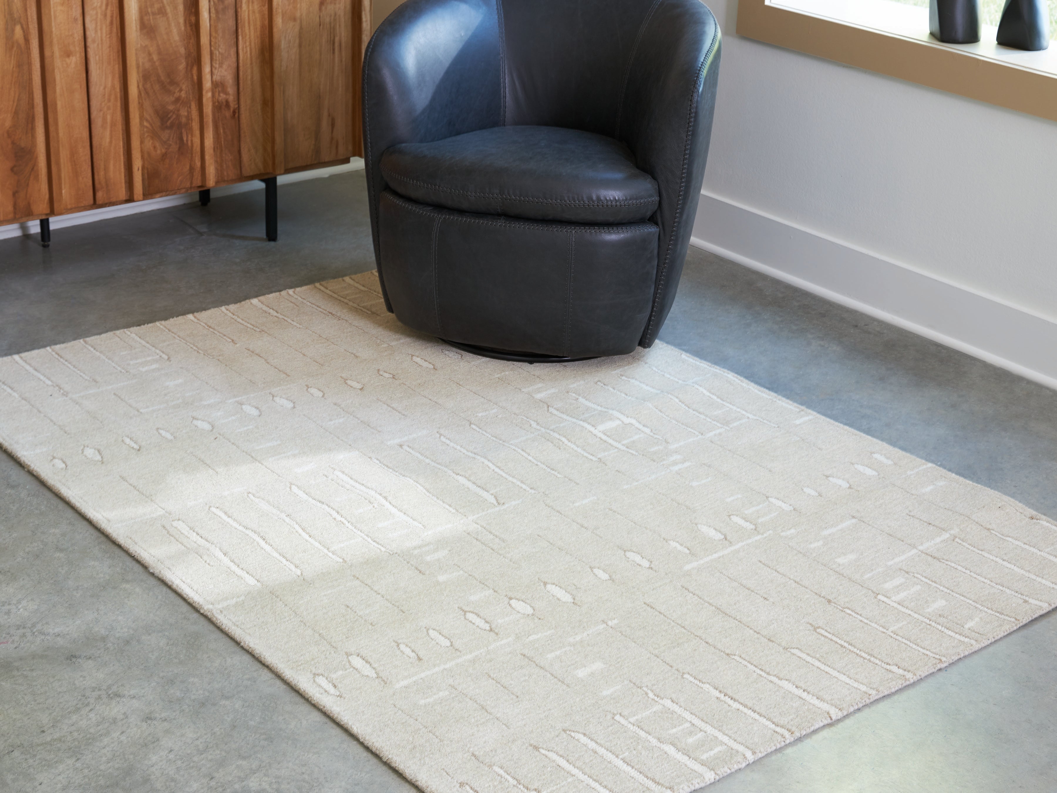 Fine Furniture & Decor - Ashley Furniture - Wolbert Rug - 5' x 7' Area Rug / Tan/Ivory - R407662