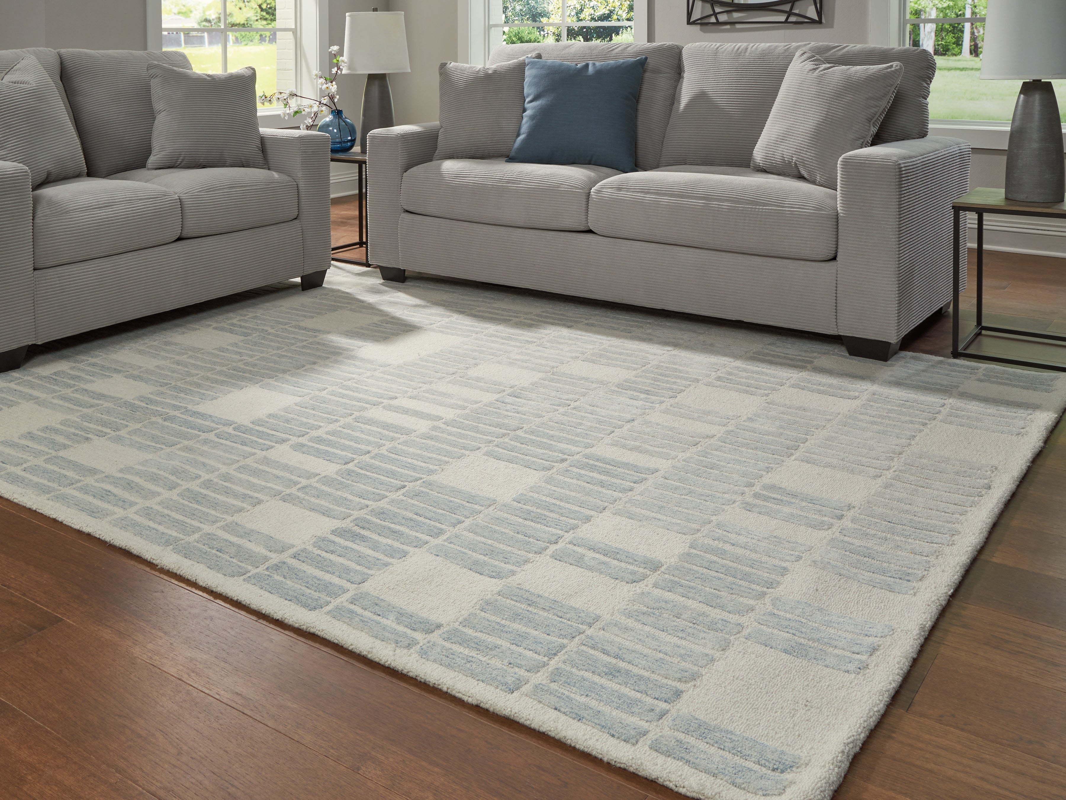 Fine Furniture & Decor - Ashley Furniture - Dylanton Rug - 7'8" x 10' Area Rug / Ivory/Blue - R407811